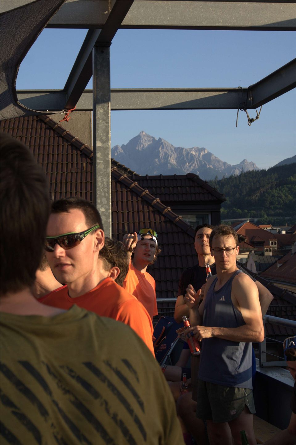 The community catching up over post-run drinks