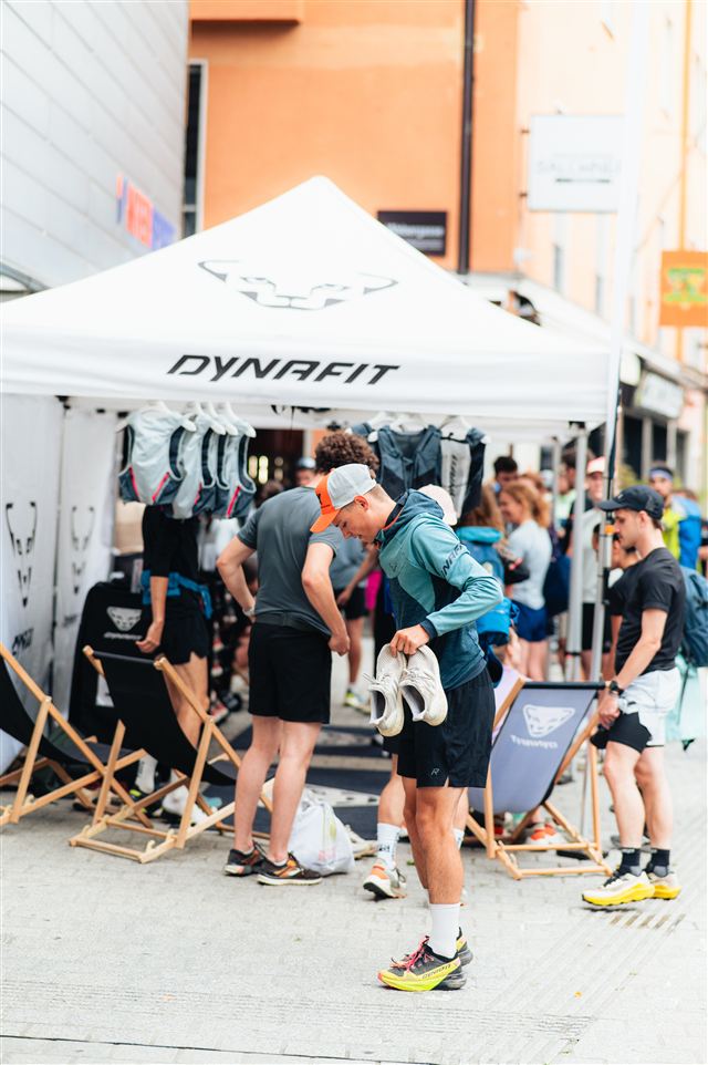 Runners discovering trail shoes and equipment at the Dynafit stand